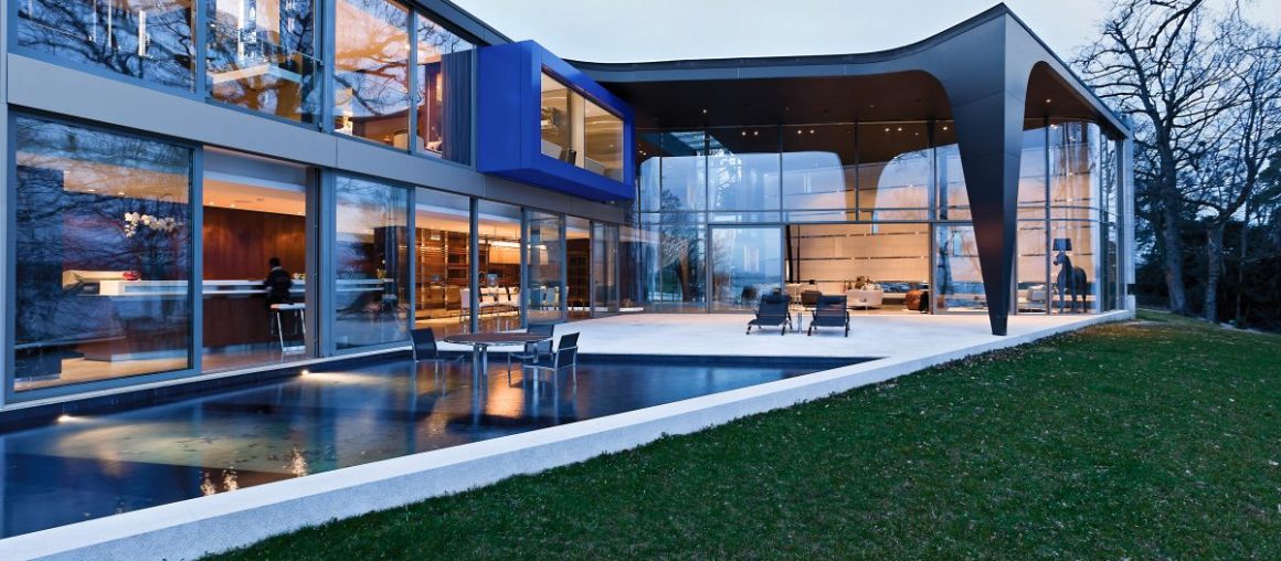 Sculptural House With A Unique Design On The Banks of Lake Geneva
