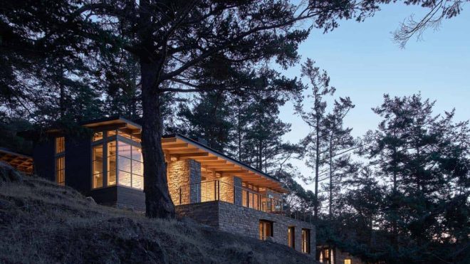 Stone-Clad Hillside Shelter Hidden Among An Island's Rugged Landscape