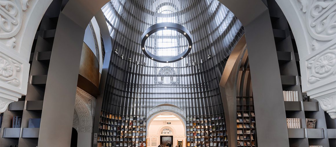 Corrugated Steel Shelves Line a Church-Turned-Poetry-Shop in Shanghai
