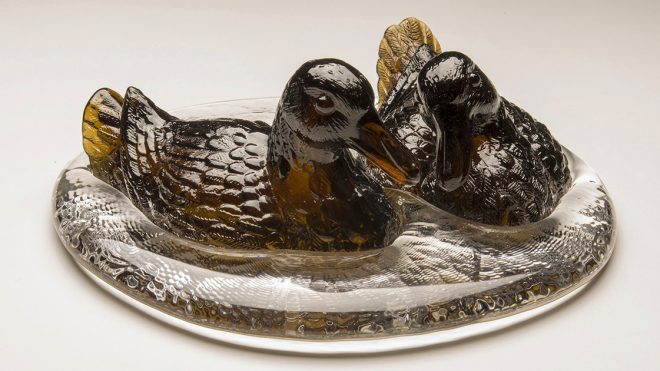 A Gleaming Series of Pressed-Glass Ducks Sculpted into Pools of Water