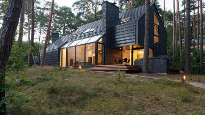 Black House In The Forest Filled With The Beautiful Sound Of Music
