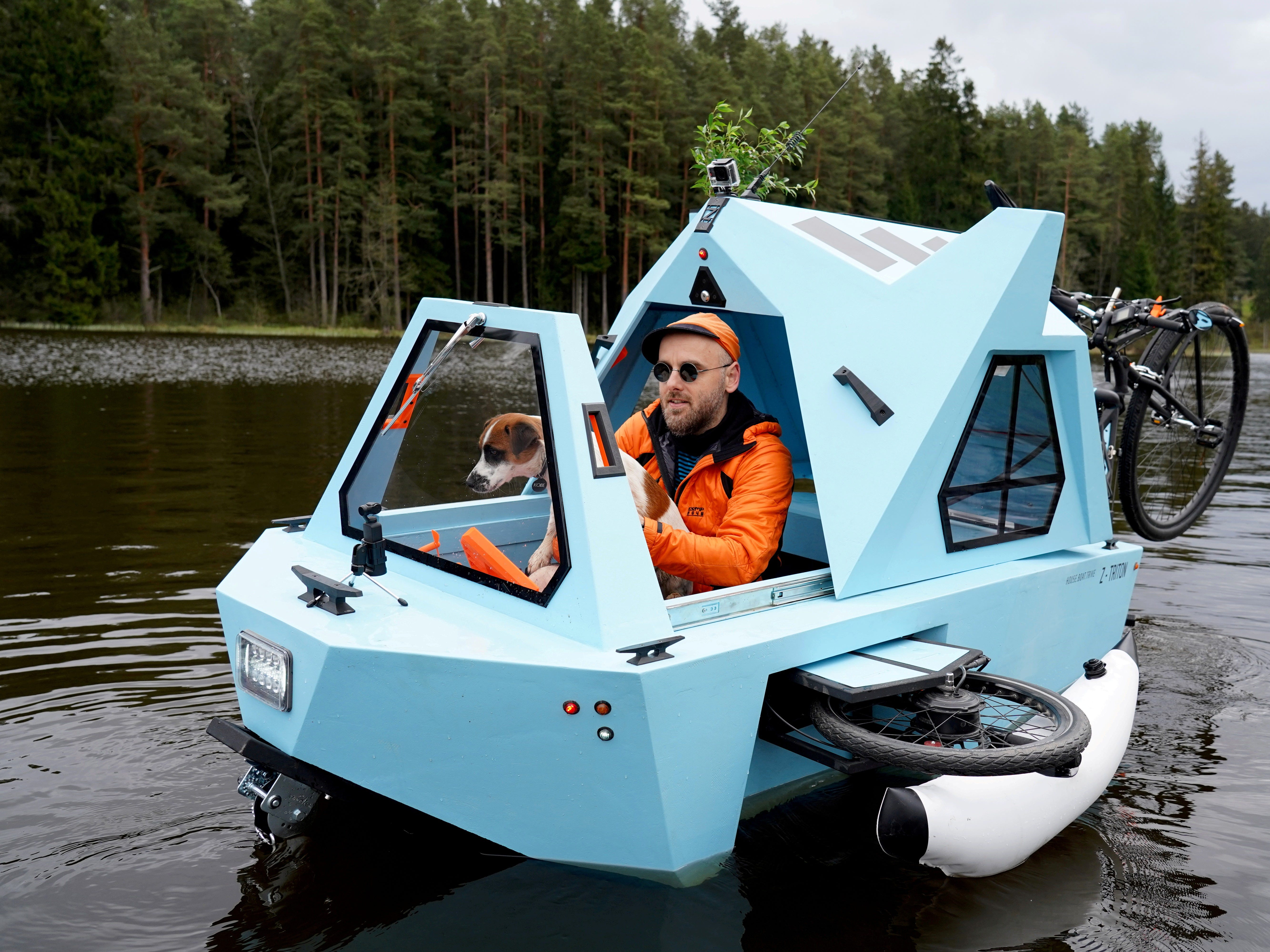 This amphibious electric boat and tricycle that triples as shelter you can sleep in at night was created for 'expeditions around the world'