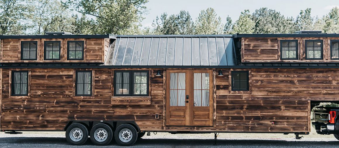 The Denali XL is a spacious, rustic tiny home on wheels