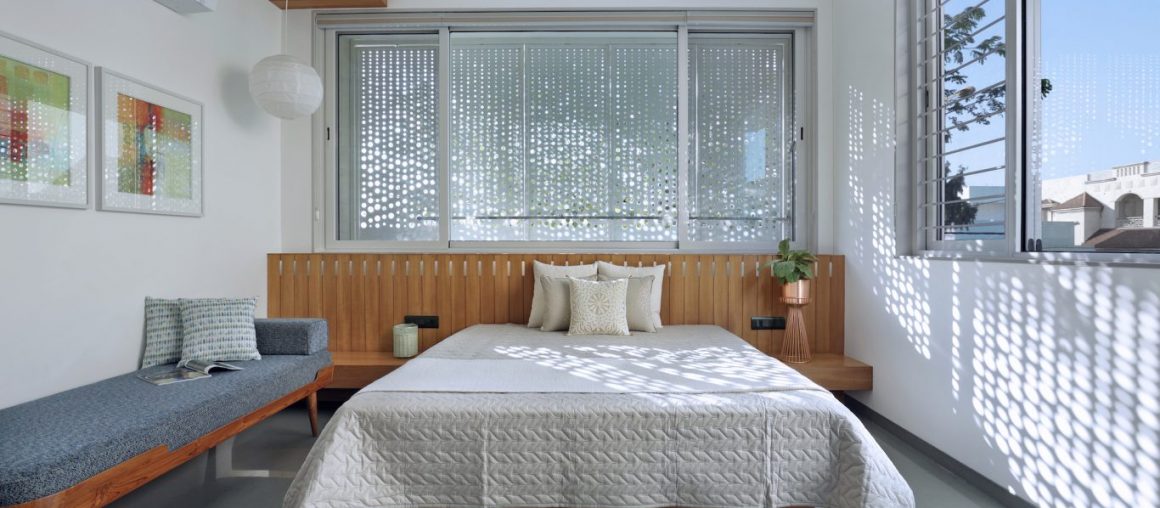 This multigenerational Vadodara bungalow is a serene escape dipped in greys & browns