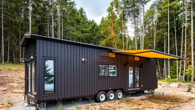 Tiny House On Wheels With Two Slide-outs And A Roomy Interior