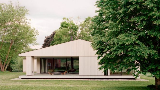 Bleached cedar frames apple orchard from Sheffield House in Massachusetts