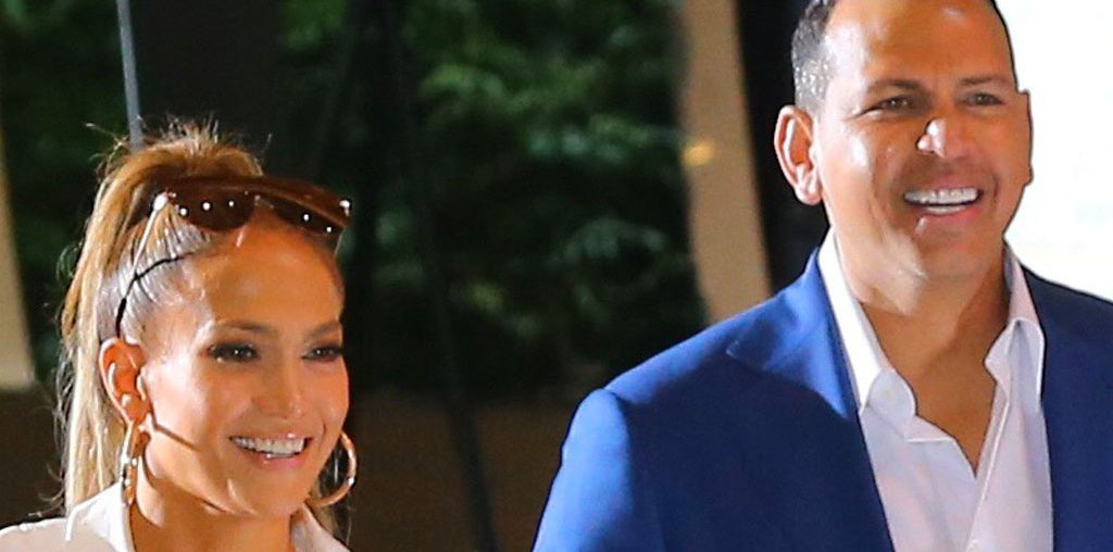 J-Lo’s Leather Leggings & Graphic Crop Top Contrast A-Rod’s Tailored Suit & Suede Boots