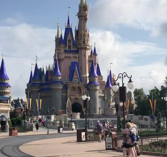 Disney debuts matching pixie dust masks for theme park employees