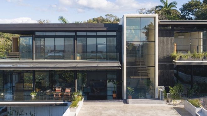 Sustainable teak home blends into the Costa Rican hills