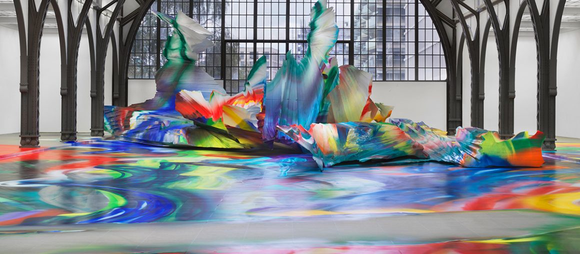 A Prismatic Installation with Giant, Abstract Forms Sweeps Across a Berlin Museum