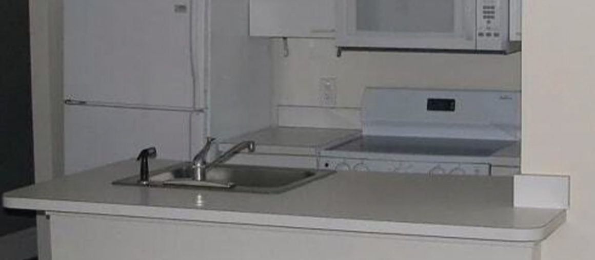 Before and After: A Rental Kitchen Now Looks Like a Custom Cookspace for Less than $500, Thanks to IKEA Hacks and Contact Paper