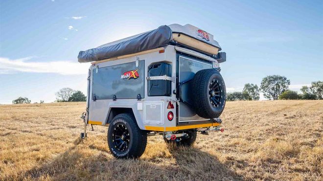 This trailer expands into a 6 people camper with a big al fresco dining adventure!