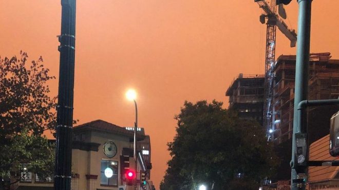 Why wildfires are turning skies a sinister orange
