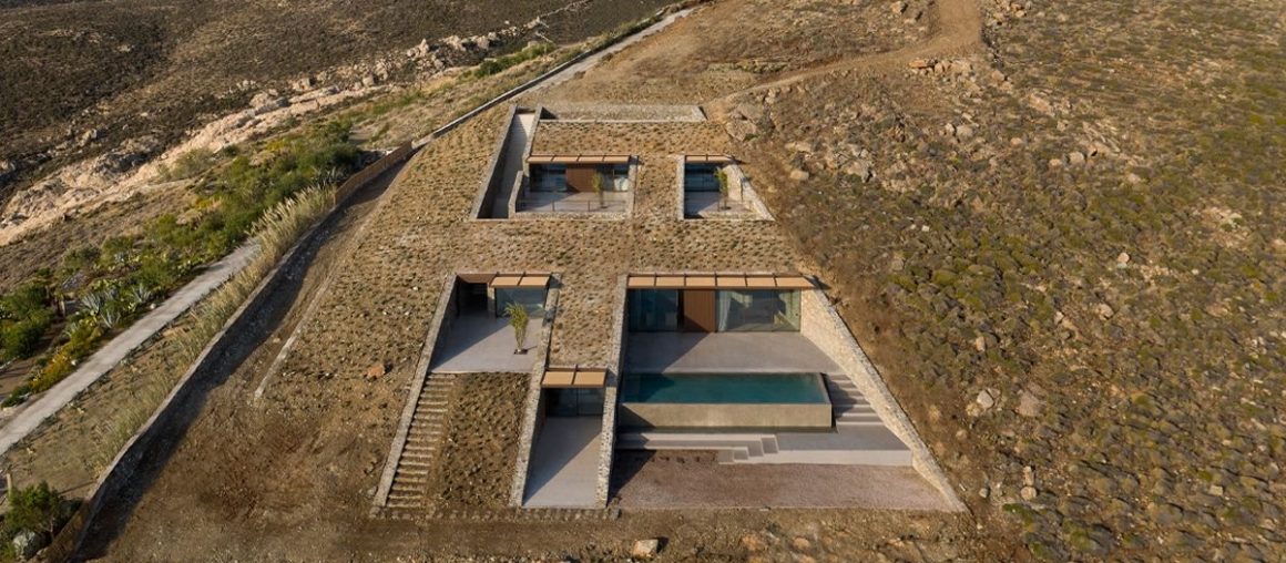 This Unassuming House Is Concealed in the Side of a Greek Island Cove